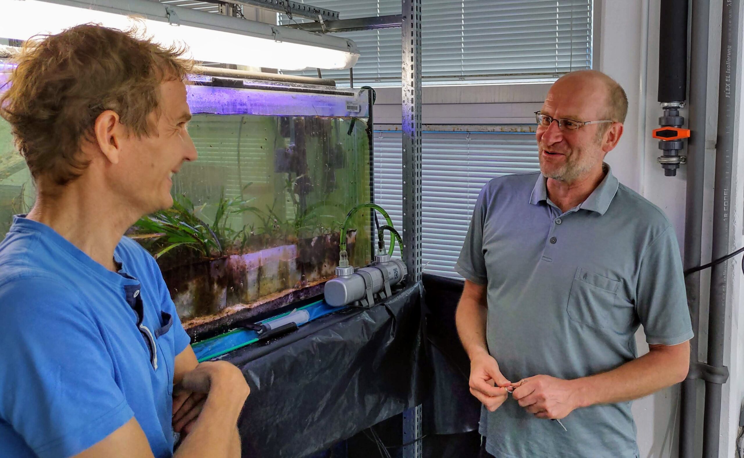 Thorsten Reusch (left) presenting the GEOMAR premises to Jonne Kotta.